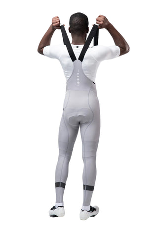 Calzamaglia ciclismo lunga uomo Gobik Absolute 7.0 Tapioca vista posteriore indossata, con bretelle ergonomiche e fondello ad alte prestazioni, ideale per allenamenti e gare invernali.