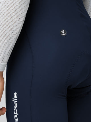 Dettaglio logo Pissei su calzamaglia invernale ciclismo Primapelle per performance e comfort su lunghe distanze.