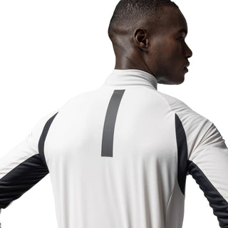 Dettaglio schiena giacca ciclismo uomo Alè R-EV1 Riparo colore stucco e nero con banda riflettente verticale – ideale per visibilità in condizioni invernali