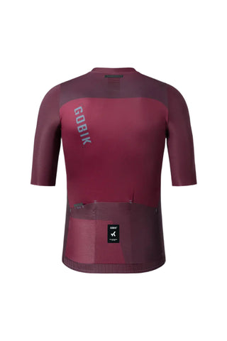 Vista posteriore maglia ciclismo Gobik, con logo riflettente obliquo e tripla tasca cargo per funzionalità durante la corsa