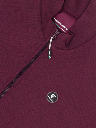 Maglia Pissei PrimaPelle bordeaux da ciclismo manica lunga, vista del logo Pissei riflettente sul petto e zip integrale per un comfort aerodinamico durante l’attività sportiva.