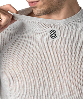 Dettaglio collo girocollo maglia intima ciclismo donna SILVERSKIN Primo, costruzione seamless ideale per il comfort in sella.