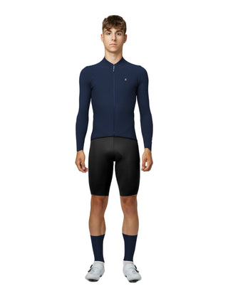Maglia Pissei PrimaPelle blu navy a manica lunga vista laterale, design aerodinamico e materiale elasticizzato per comfort e velocità.