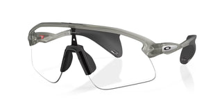 Occhiali da ciclismo Oakley Stunt Devil Clear to Black Iridium Photochromic vista tre quarti | BBike