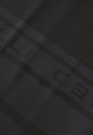 Dettaglio tessuto scaldacollo Castelli Pro Thermal Head Thingy nero, materiale tecnico caldo e traspirante per ciclismo su strada e mountain bike.